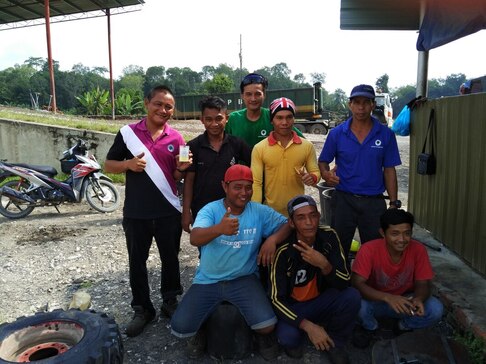 Workers in Malaysian palm oil